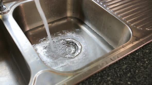 Kitchen sink draining slowly. Just replaced metal corroded pipes